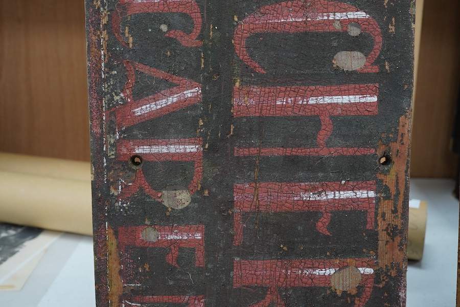 Two French advertising signs; a painted wood sign, width 157cm, and a painted steel sign, width 125cm. Condition - poor, general surface rust and paint loss.